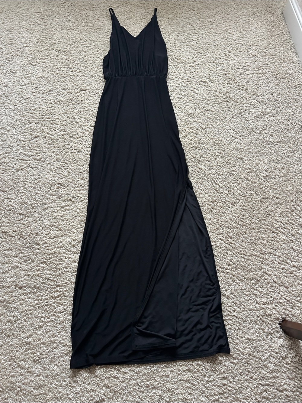 Long stretchy women’s dress with open back